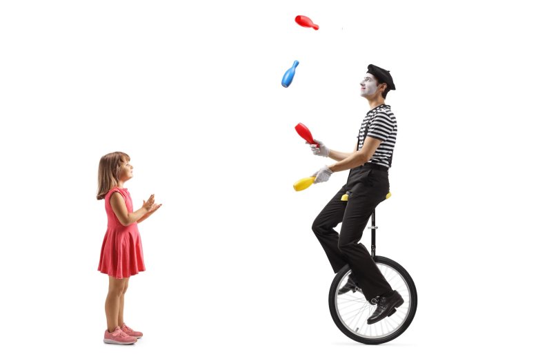 Клоун на одноколесном велосипеде