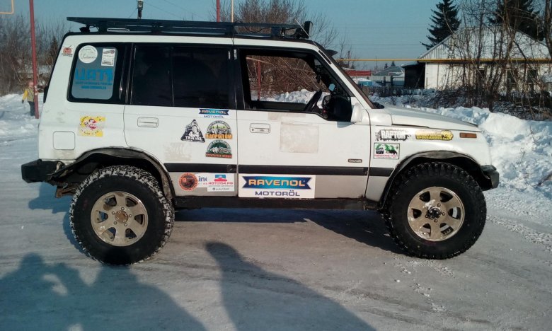 235 75 r15 сузуки эскудо