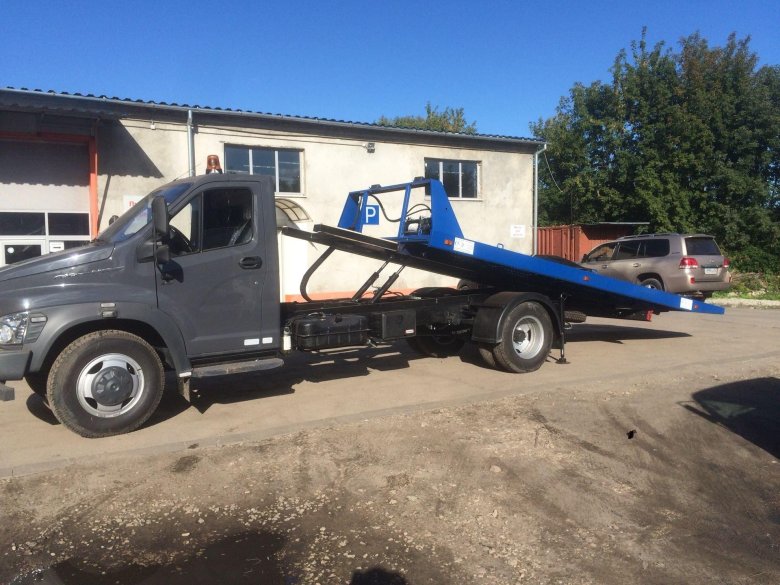 Газон некст эвакуатор со сдвижной платформой