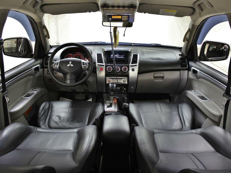 Mitsubishi pajero sport 2 поколение салон