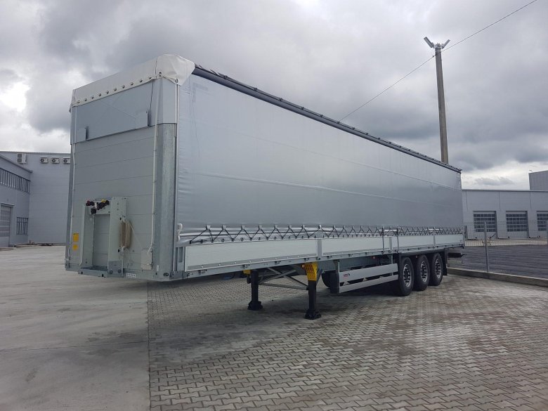 Шторно-бортовой полуприцеп schmitz