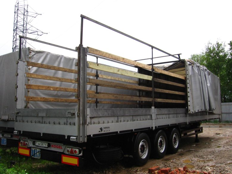 Шторно-бортовой полуприцеп с кониками грюнвальд