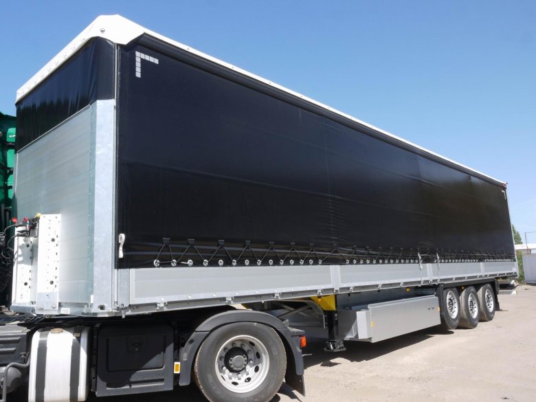 Шторный полуприцеп шмитц