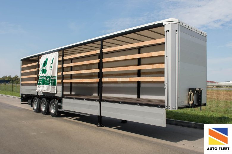 Грюнвальд бортовой полуприцеп