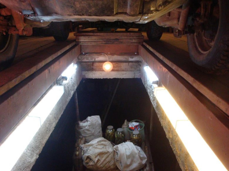 Освещение в смотровой яме гараже