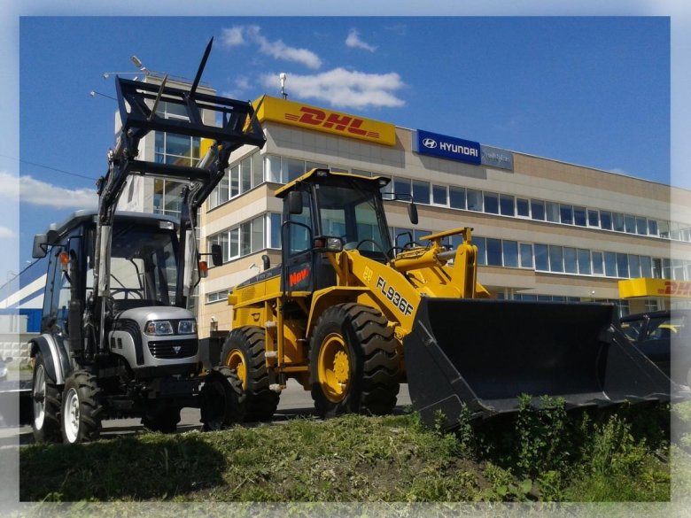 Тракторный погрузчик