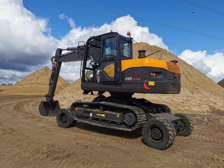 Колесно гусеничный экскаватор