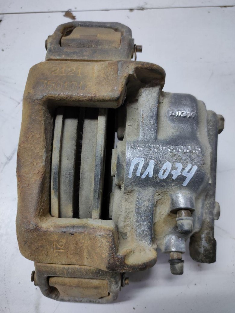 Суппорт тормозной передний левый chevrolet