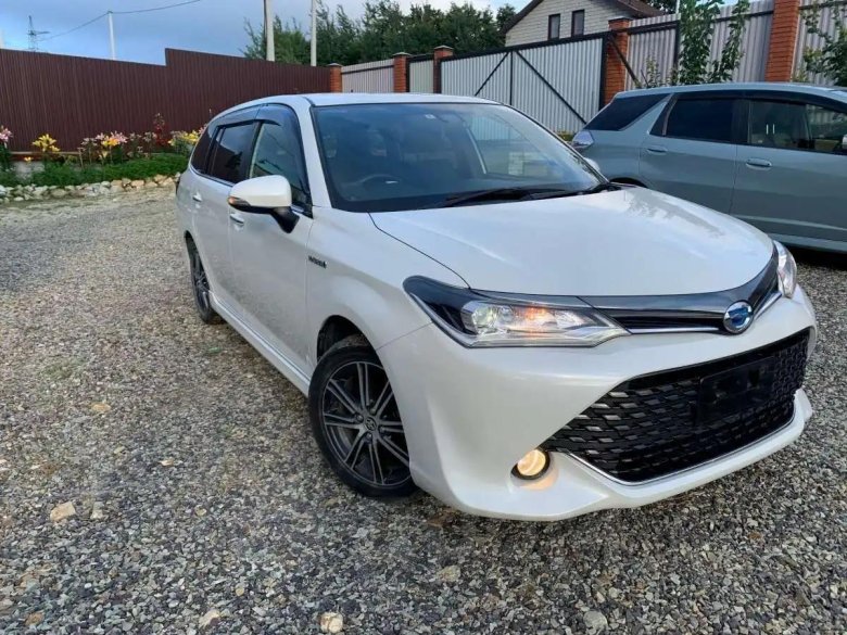 Тойота королла филдер гибрид 2018