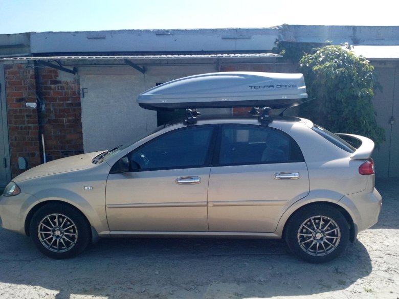 Багажник thule chevrolet lacetti 2010