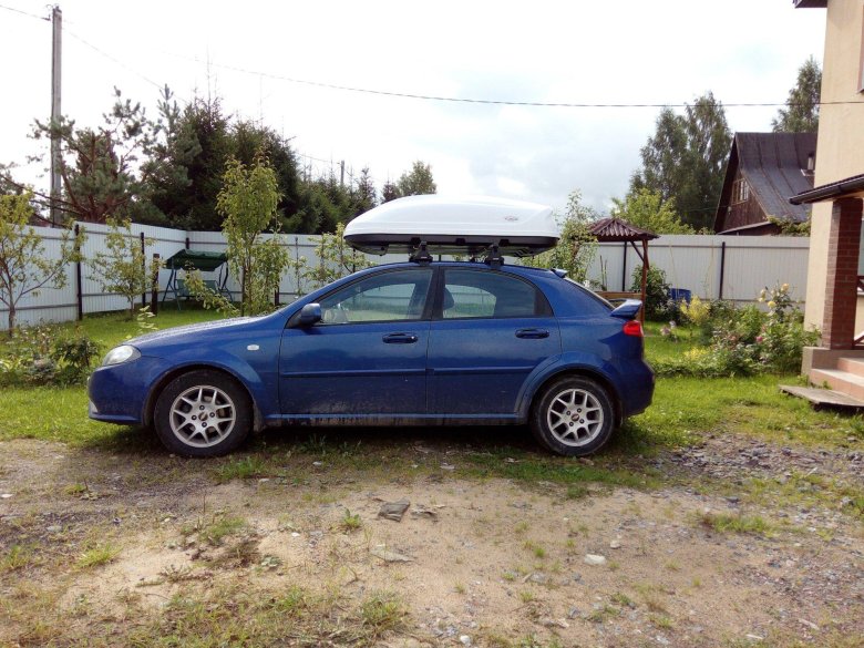 Багажник thule chevrolet lacetti 2010