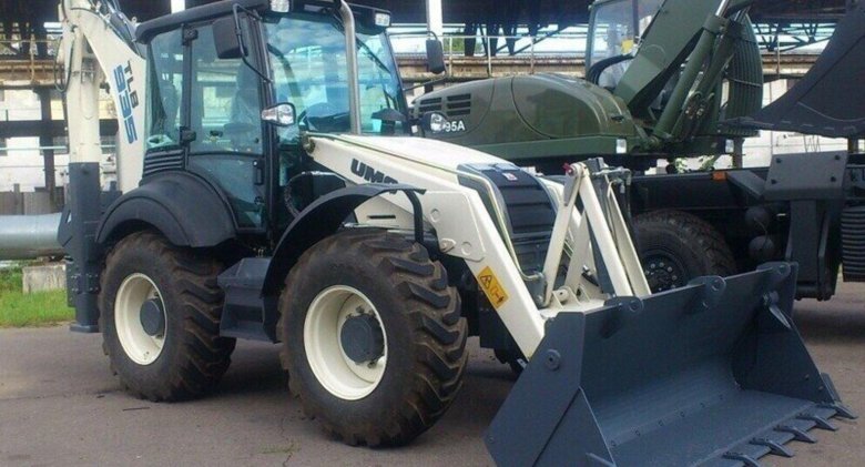 Экскаватор погрузчик тлб 935