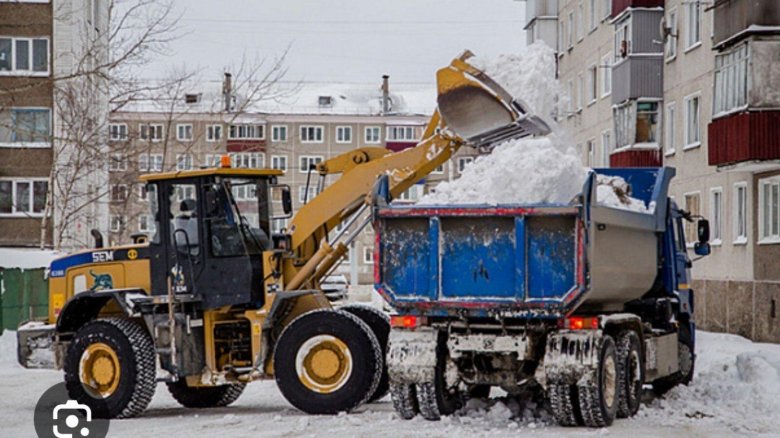 Уборка снега фронтальным погрузчиком