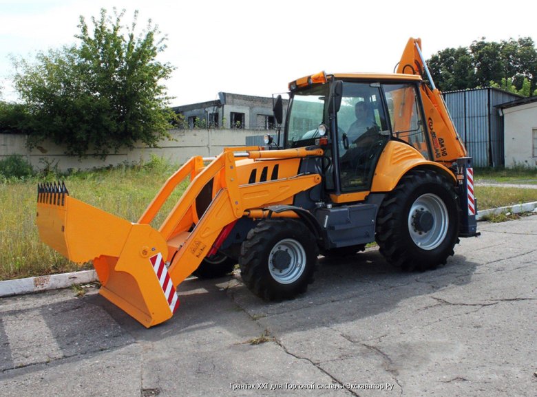 Экскаватор-погрузчик дэм-310