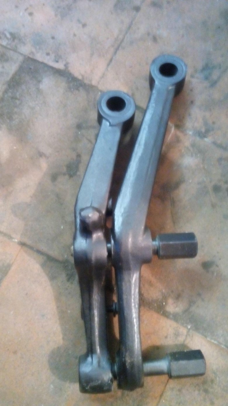 Рычаг поворотного кулака волга 31105