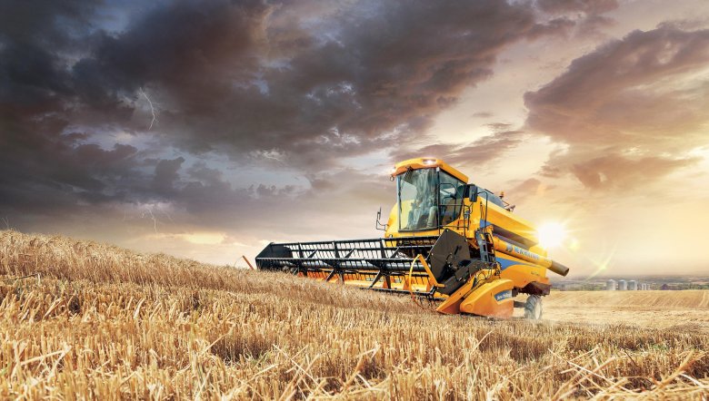 Комбайн нью холланд