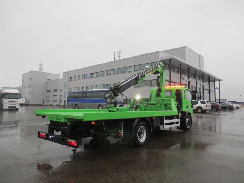 Кму с эвакуаторными аутригерами