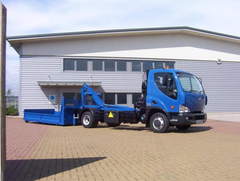 Исузу эвакуатор со сдвижной платформой