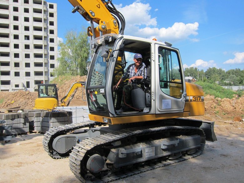 Либхер экскаватор гусеничный