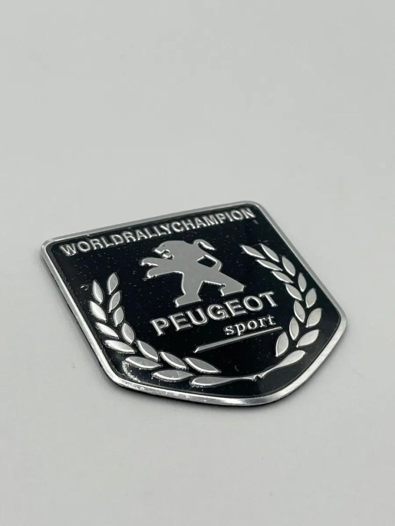 Шильдик пежо