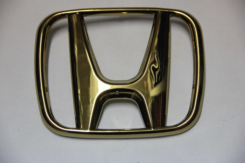 Значок хонда золотой