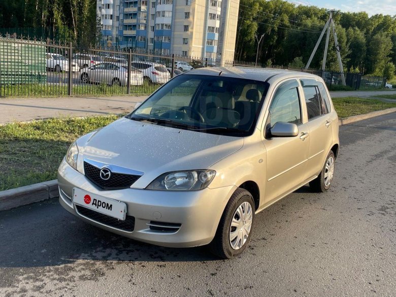Мазда демио 2003