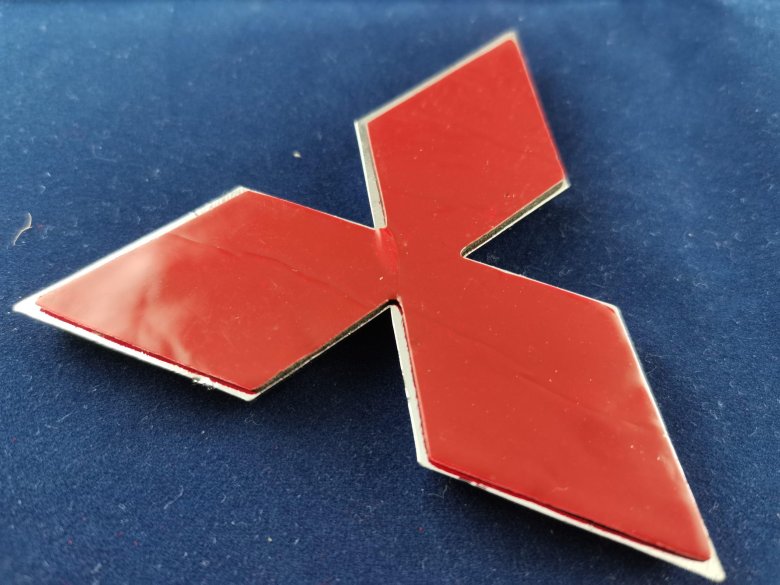 Эмблема митсубиси