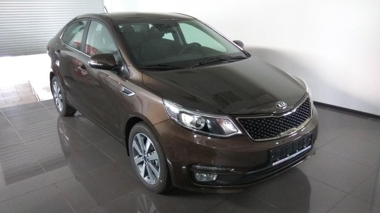 Kia rio 2015 коричневый хэтчбек