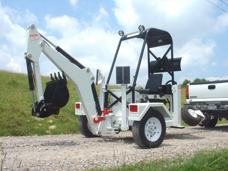 Мини экскаватор прицепной