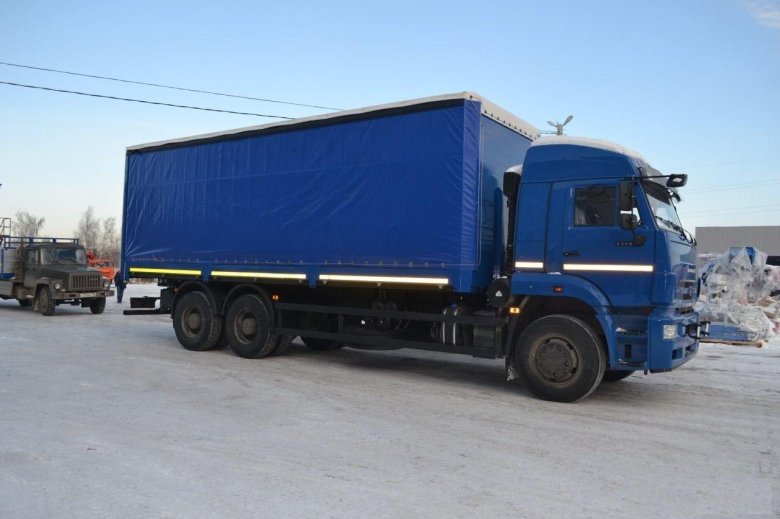 Камаз бортовой тентованный 65117