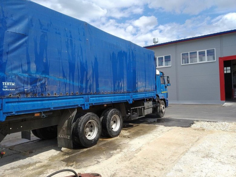 Камаз бортовой тентованный 65117