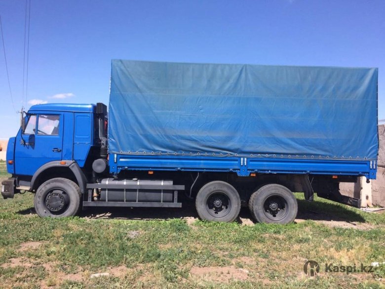 Камаз бортовой тентованный 53215