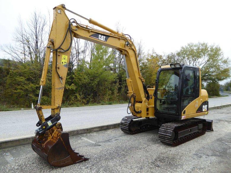 Мини экскаватор катерпиллер