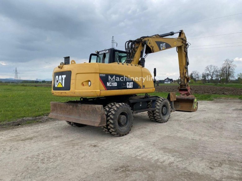 Экскаватор caterpillar