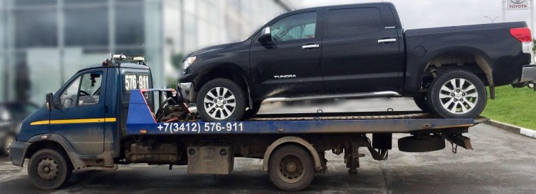 Машина эвакуатор