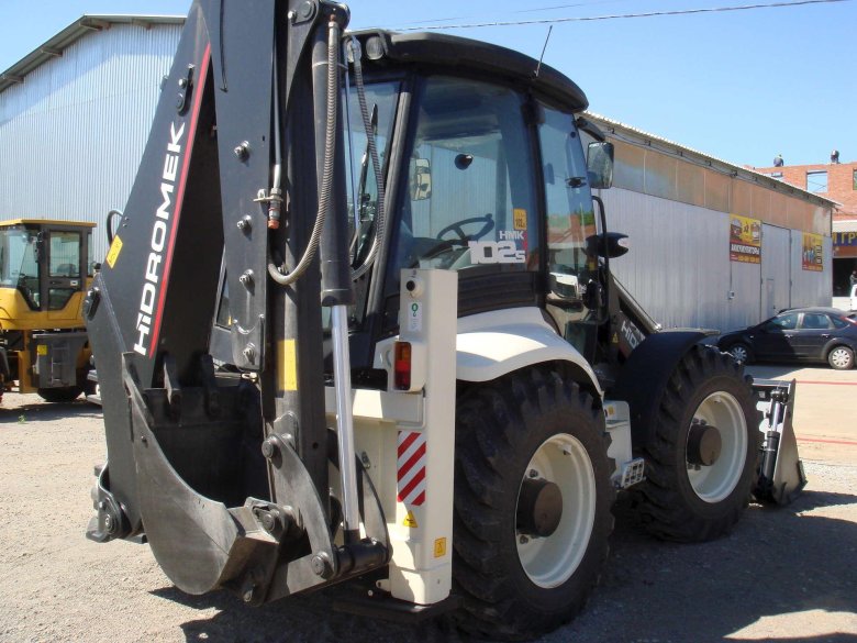Экскаватор погрузчик hidromek hmk 102 s