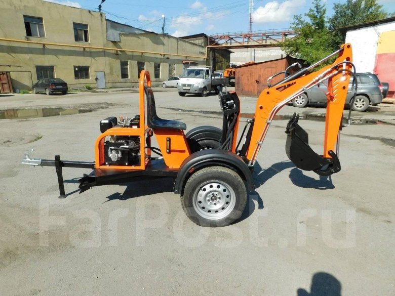 Колесный мини экскаватор