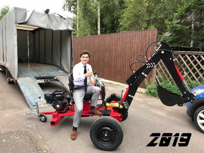 Прицепной мини - экскаватор landformer 100.