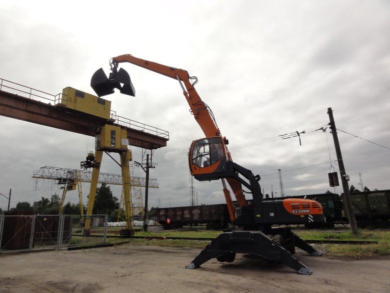 Грейферный перегружатель