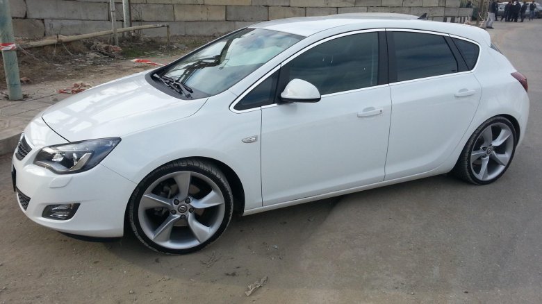 Опель астра j седан r18