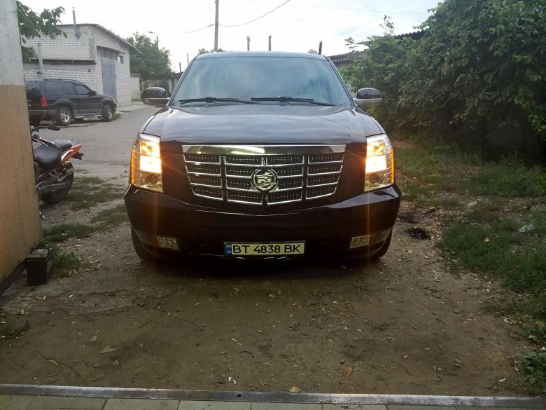 Кадиллак эскалейд оранжевый