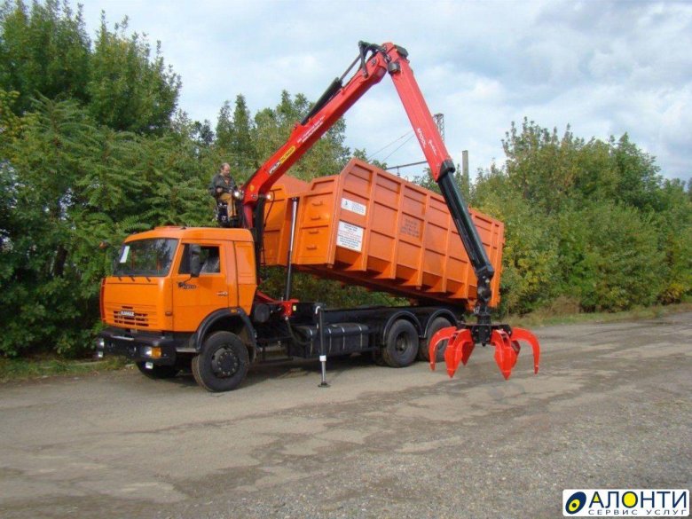 Камаз 65115 ломовоз с манипулятором для мусора