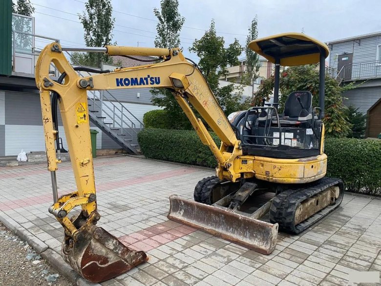 Komatsu экскаватор