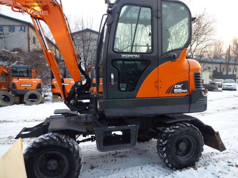 Колесный мини экскаватор doosan
