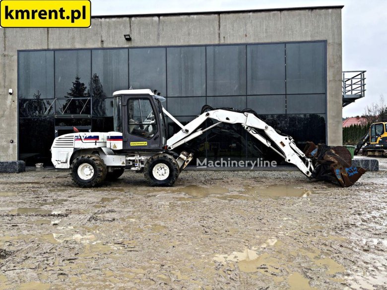 Экскаватор погрузчик terex