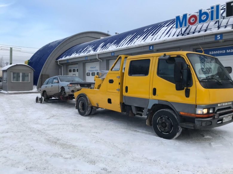 Исузу эвакуатор со сдвижной платформой