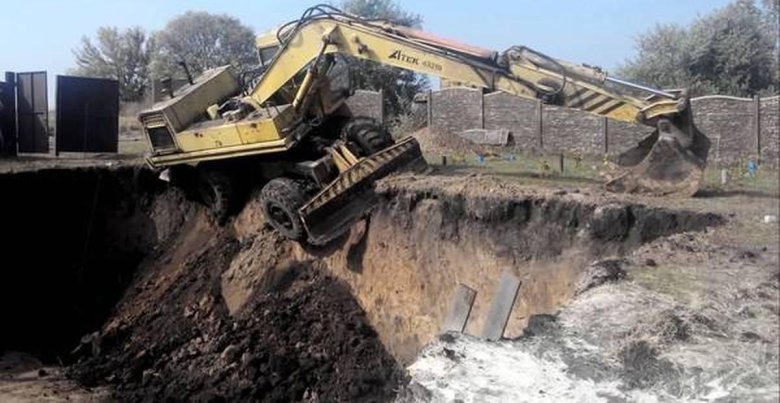 Работа экскаватора