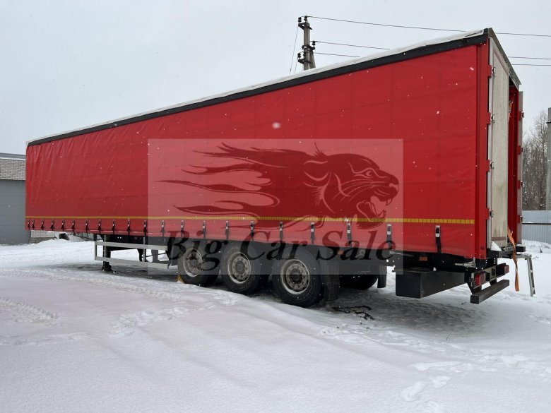 Полуприцеп красный шторный шмитц
