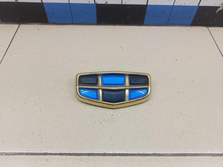 Эмблема geely emgrand