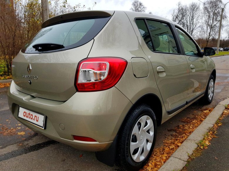 Рено Сандеро 2011 бежевый